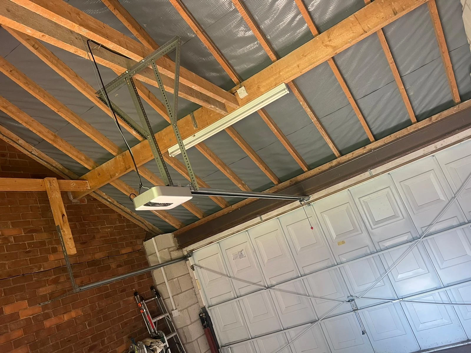 How Do I Check the Tension on My Garage Door?